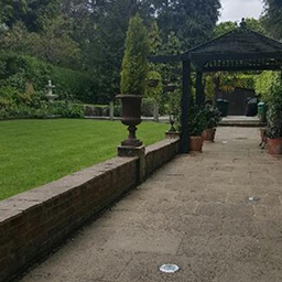 garden with a path and pavilion 