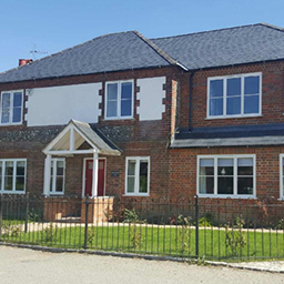 house with a front garden and a fence