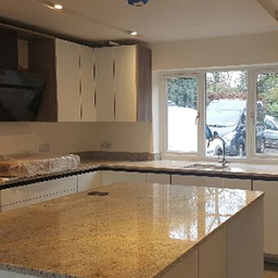 a marble surfaced kitchen